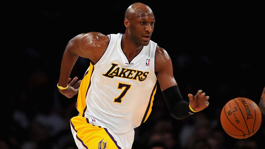 Former NBA star Lamar Odom attends Trump cryptocurrency gala amid protests
