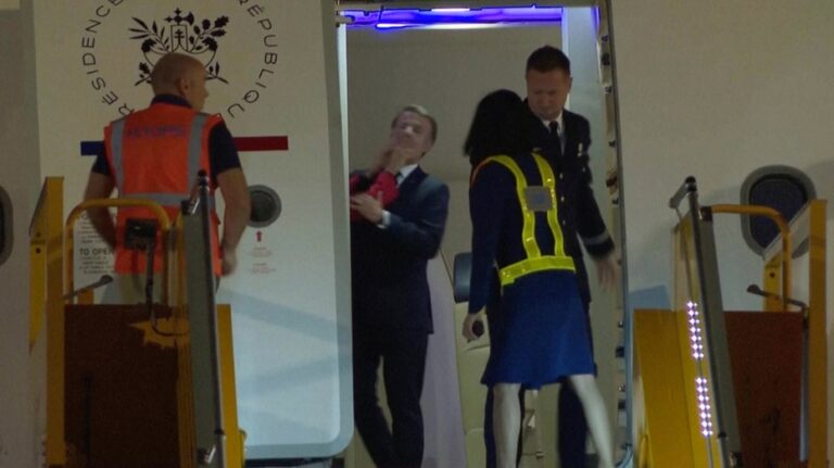 Emmanuel Macron's wife seen shoving him in the face in viral clip as France's first couple arrives in Vietnam