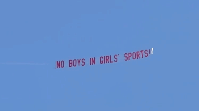 Plane flying 'No Boys in Girls' Sports' banner over track meet goes viral as trans athlete dominates