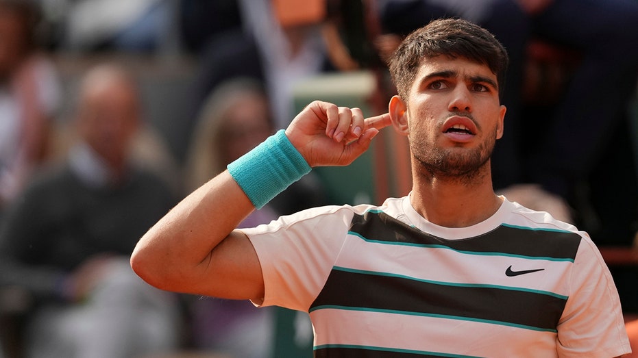 Carlos Alcaraz comes back to shock Jannik Sinner for French Open win