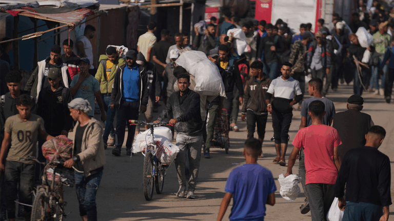 Dozens of Palestinians killed on their way to collect aid in Gaza, Hamas-run ministry claims