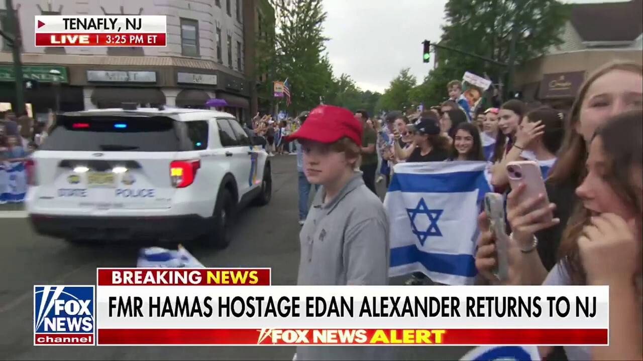 Freed hostage Edan Alexander returns home as families gather in 'celebration of love'