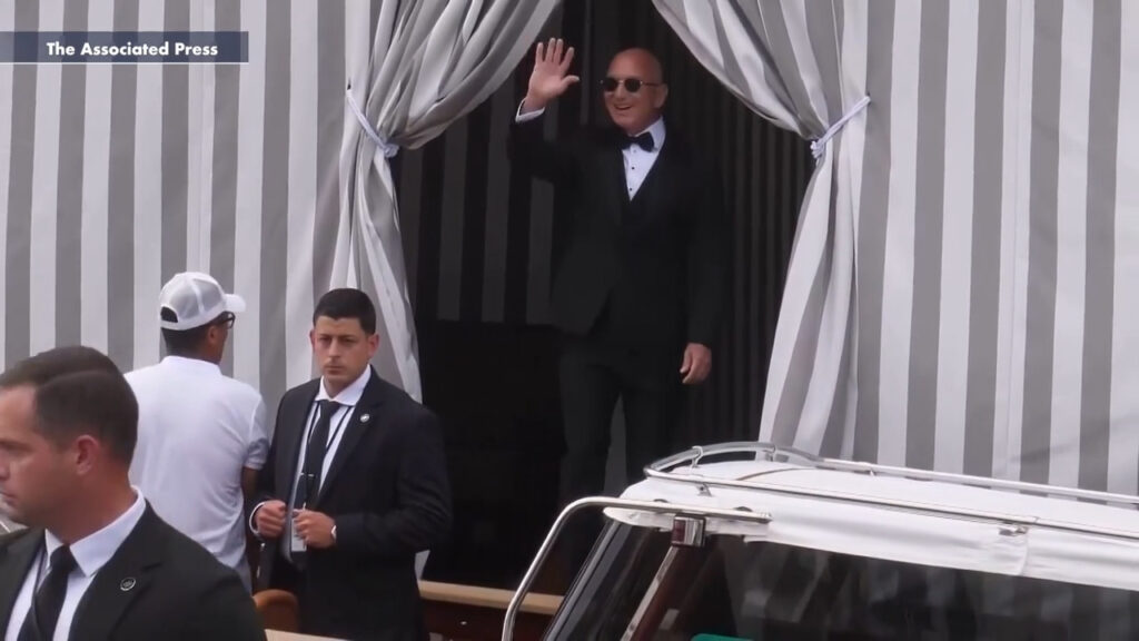 Jeff Bezos exits hotel in Venice ahead of wedding to Lauren Sánchez