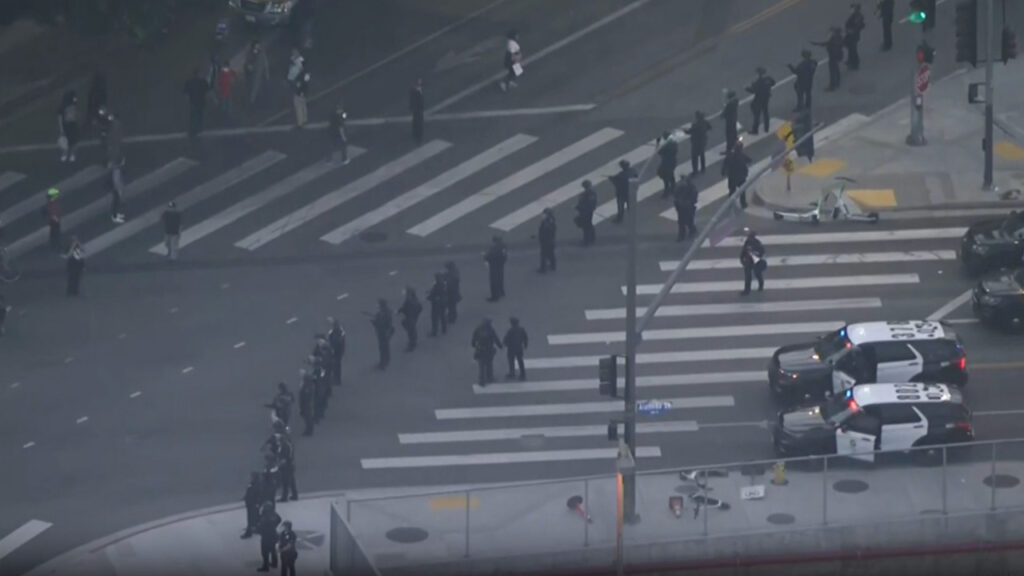 WATCH LIVE: Protest erupts after immigration raid, police in standoff