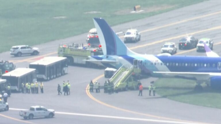 JetBlue aircraft rolls off runway while landing at Boston's Logan Airport