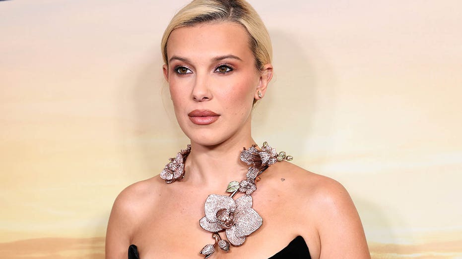 'Stranger Things' star Millie Bobby Brown sizzles in tiny string bikini during beach getaway