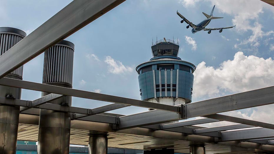 East Coast flyers face travel nightmare after weather sparks delays ahead of holiday weekend