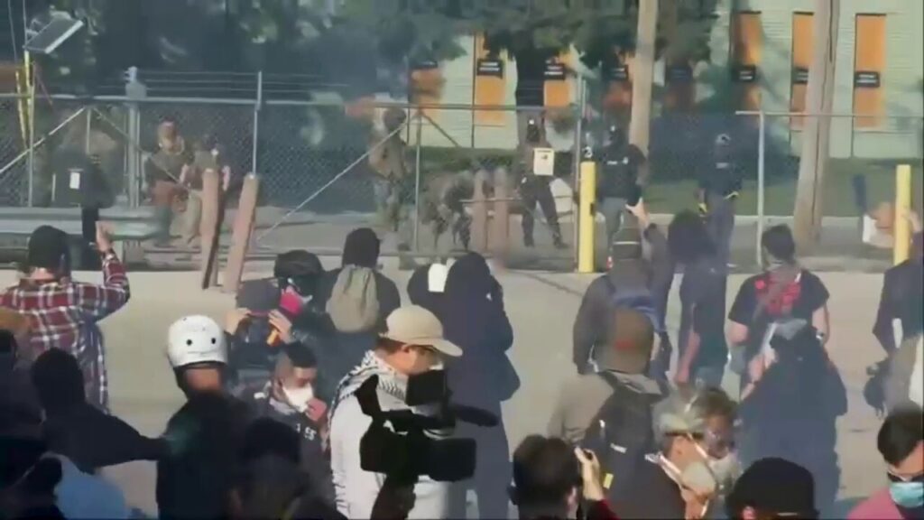 Law enforcement fires pepper balls at anti-ICE protesters near Chicago