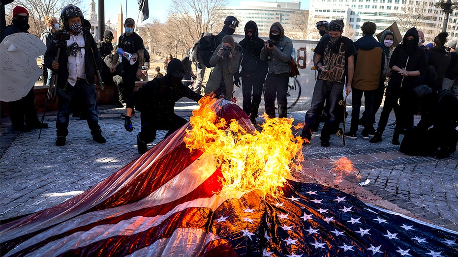 University of Virginia students holding 'antifascist' 'flag burning' event to protest Trump order