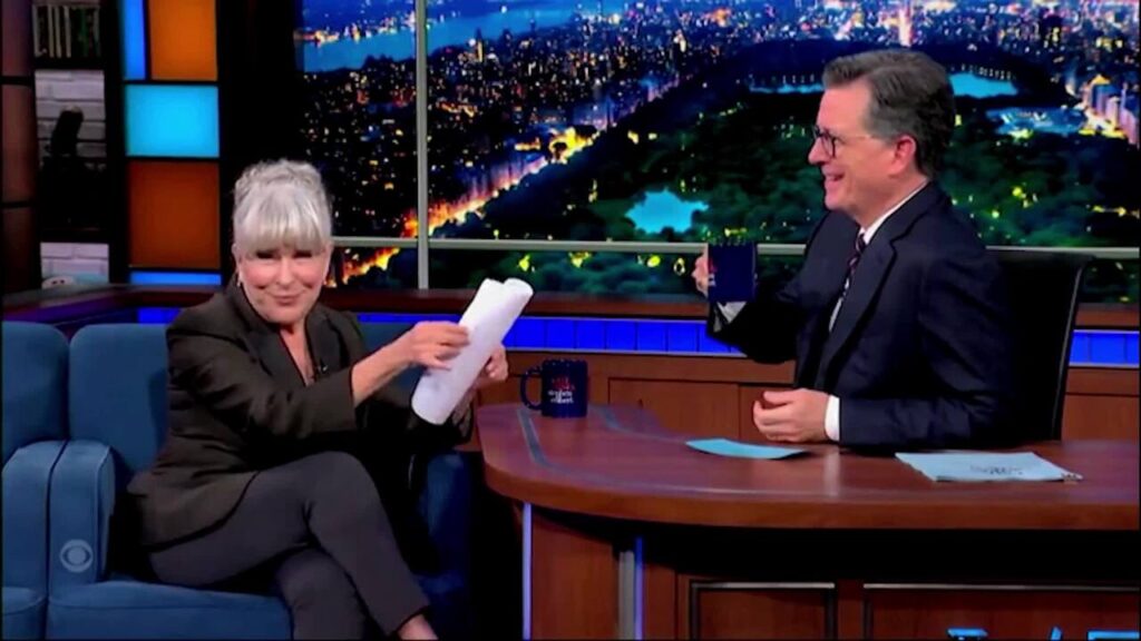 Bette Midler serenades Colbert with parody of 'Wing Beneath My Wings' attacking Trump