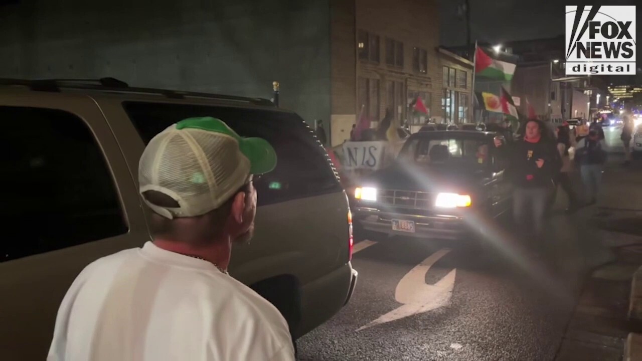 SQUARING OFF IN PORTLAND: Fed-up residents confront protesters on streets of troubled city