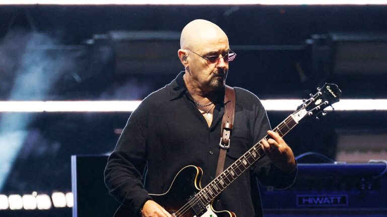 Oasis guitarist diagnosed with cancer, forced to miss reunion tour dates