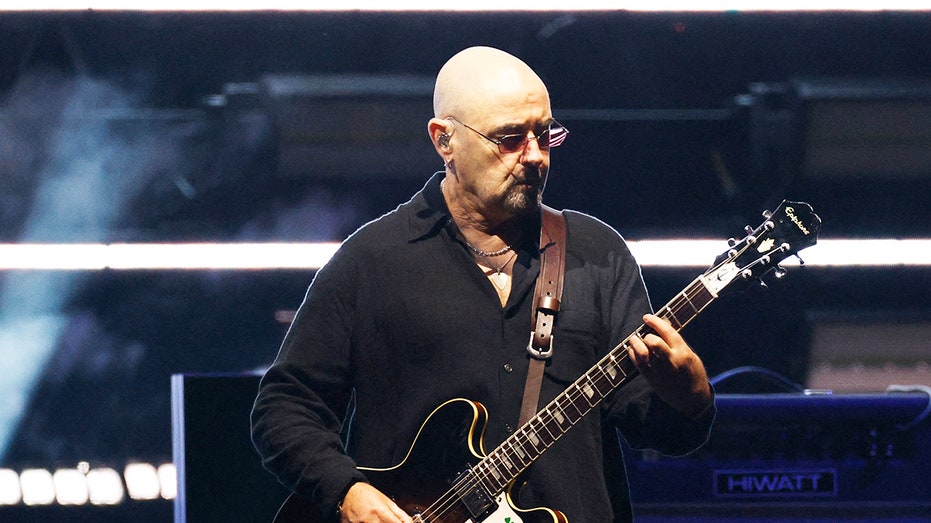 Oasis guitarist diagnosed with cancer, forced to miss reunion tour dates