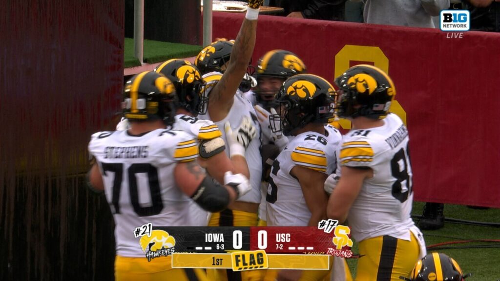 Gronowski floats it in the endzone connecting with Dayton Howard for an early Iowa lead