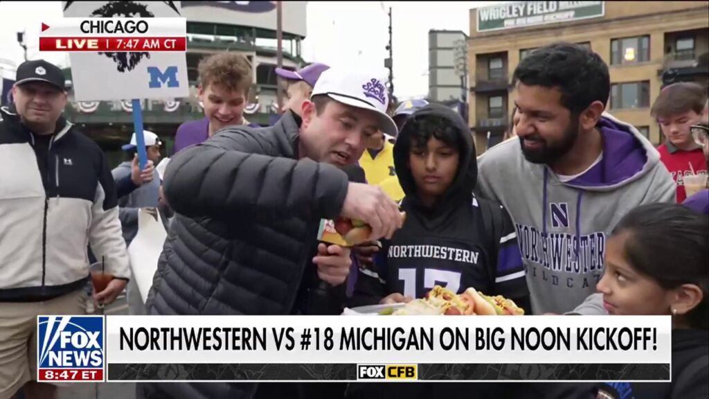 Michigan, Northwestern fans enjoy Chicago-style hot dogs at Wrigley Field