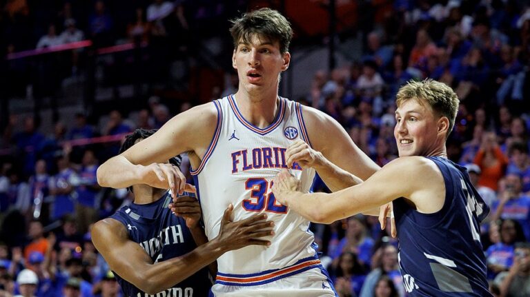 World's tallest teenager Olivier Rioux makes collegiate basketball history for Florida Gators