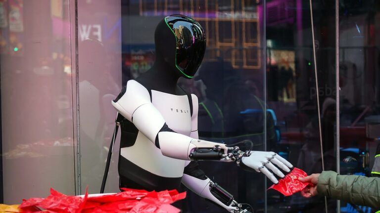 Elon Musk teases a future run by robots