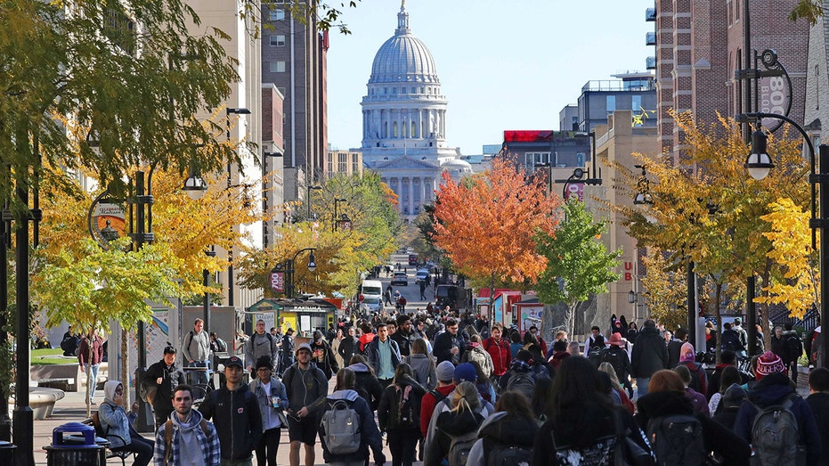 Graphic anti-ICE imagery at University of Wisconsin shows agent with bullet in head: 'speak their language'