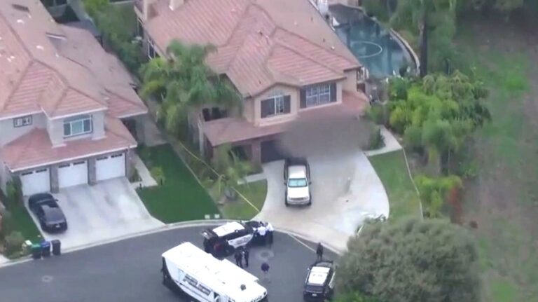 Son suspected in killing of beloved doctor and wife before torching car and taking his own life