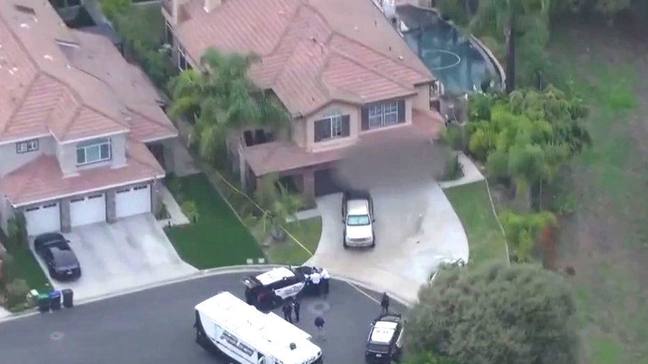 Son suspected in killing of beloved doctor and wife before torching car and taking his own life