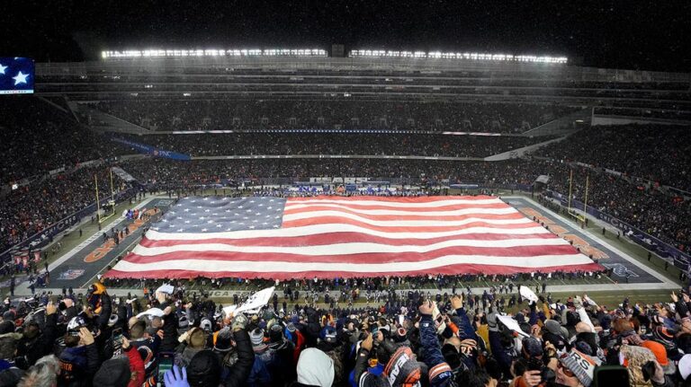 Rams, Bears players go wild for national anthem singer before playoff game