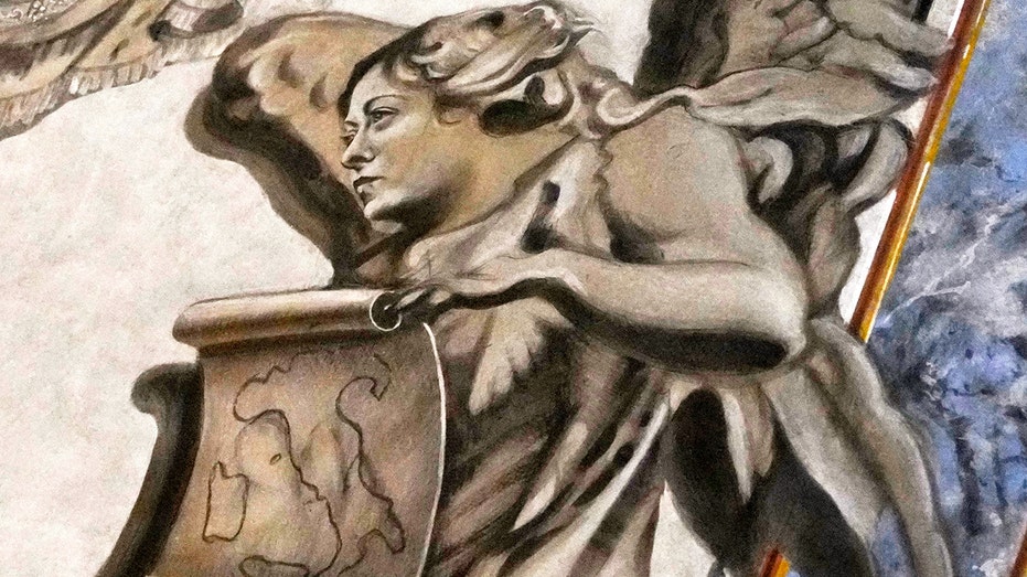 Mysterious cherub face pops up at sacred tourist site as officials launch investigation