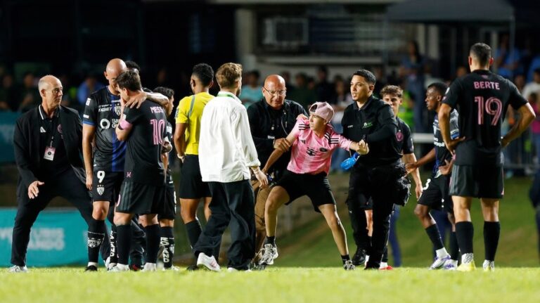Lionel Messi tackled to the ground during game after his famed bodyguard was not allowed on sidelines