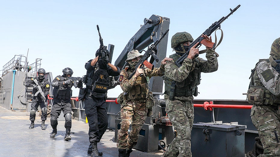 Iran possibly repositions strike drones amid Russia drills in Strait, expert says