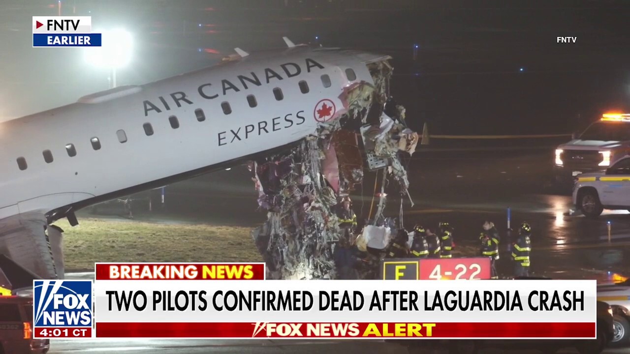 Two pilots dead after plane collides with vehicle at LaGuardia Airport