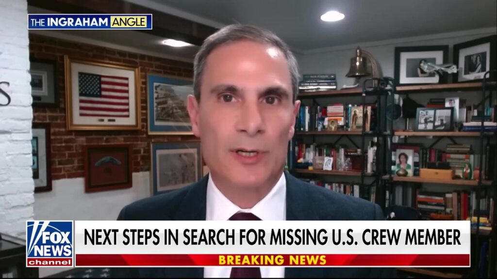 Search continues for missing American crew member as the sun rises in Tehran