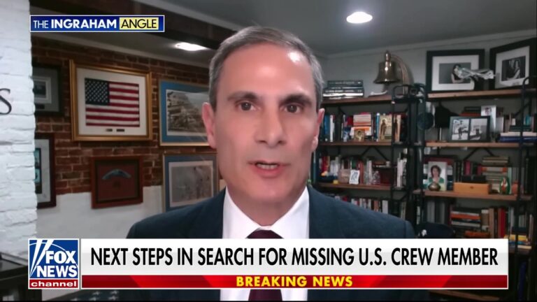 Search continues for missing American crew member as the sun rises in Tehran