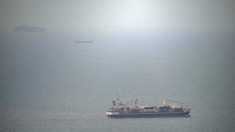 Cargo ship attacked by small craft near Strait of Hormuz, UK maritime agency says